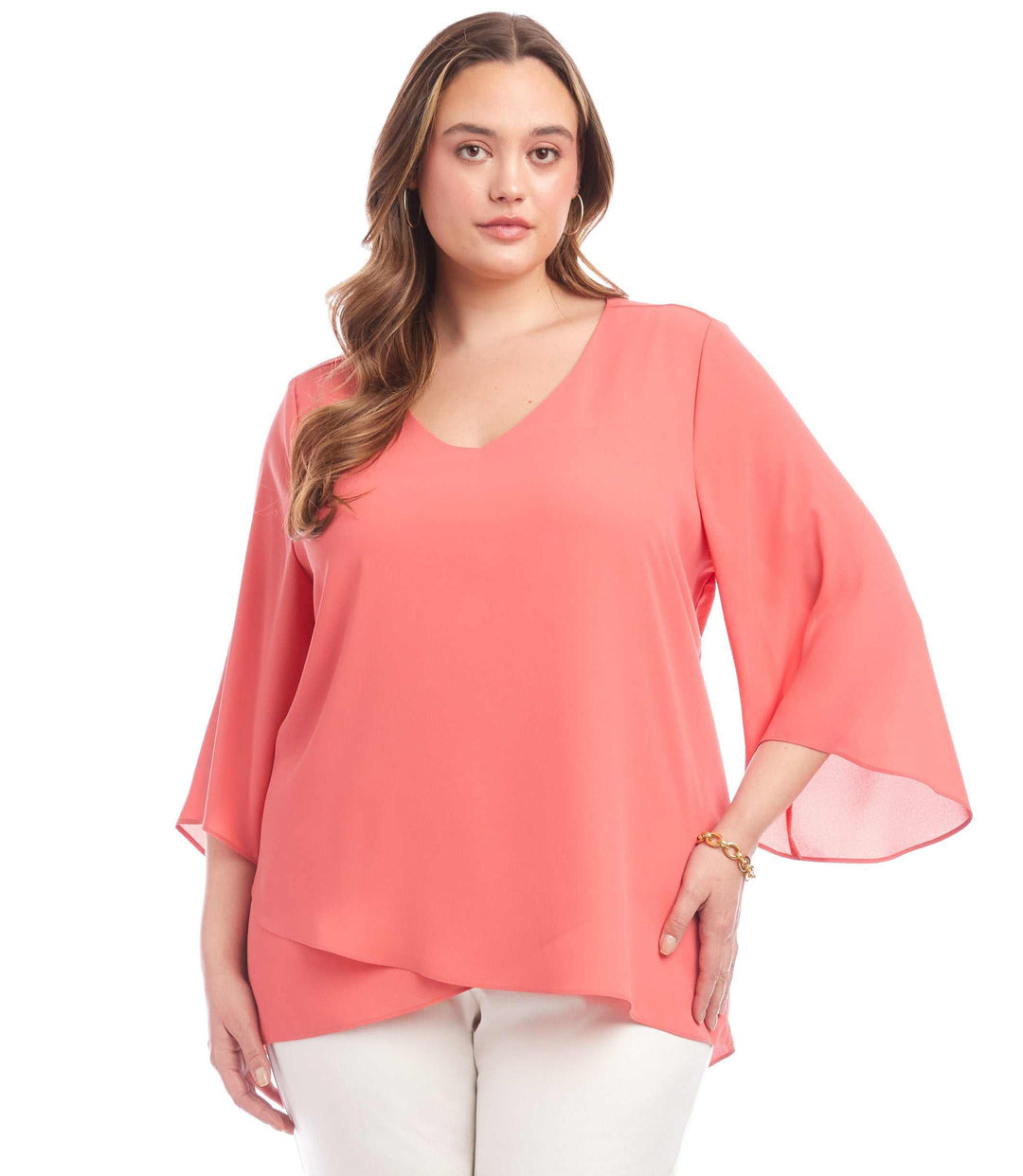 Plus size coral bracelet sleeve top with V-neck and layered asymmetrical hem in silky crepe fabric