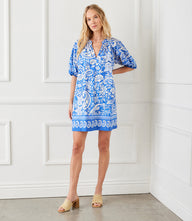 Petite size puff sleeve peasant dress with paisley border cotton print and elasticized cuffs