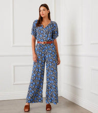 Petite size puff sleeve peasant top with blue floral crepe print and relaxed fit