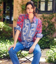 Ruched sleeve border print shirt with collared neckline and button-front closure in lightweight cotton fabric