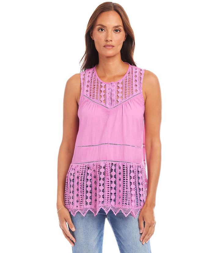 Woman wearing pink lace trim sleeveless top with keyhole front and relaxed fit.
