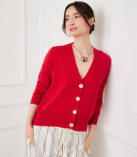 Classic V-neck cardigan sweater with button-front, wide ribbed hem, and extended cuffs