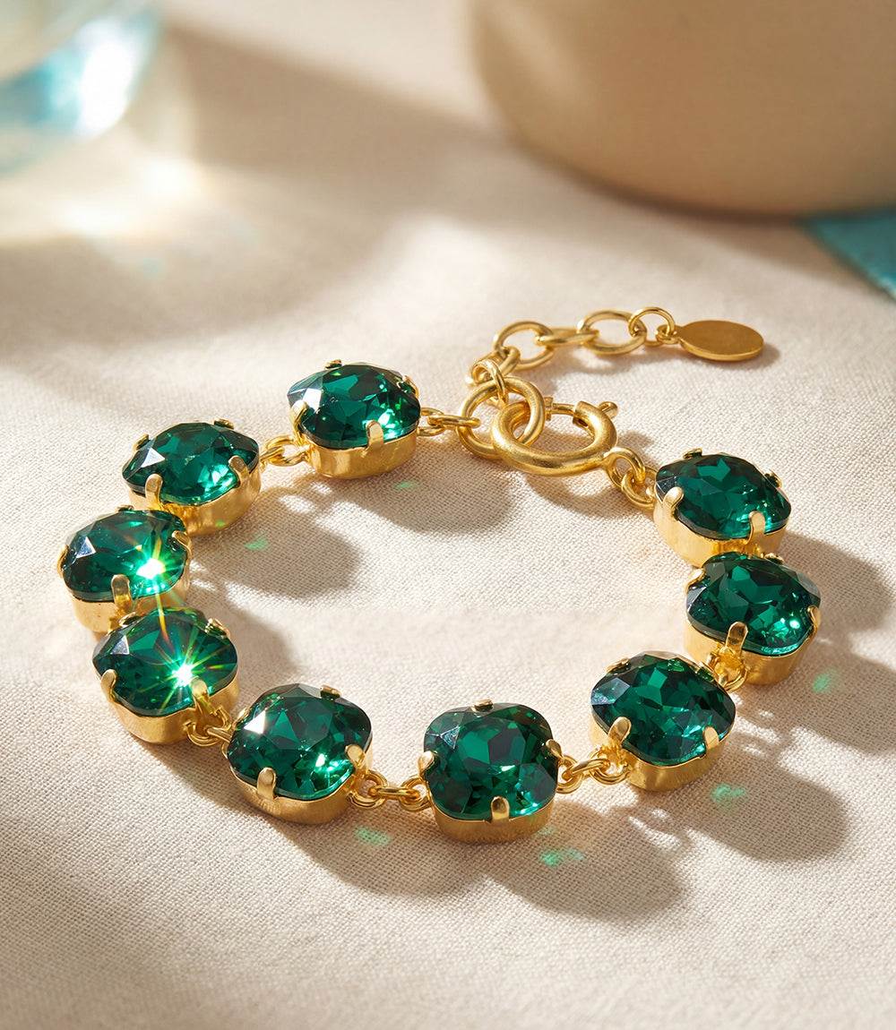 Large crystal bracelet with oversized emerald Swarovski crystals set in gold-plated brass