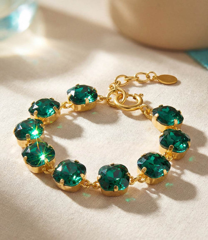Large crystal bracelet with oversized emerald Swarovski crystals set in gold-plated brass