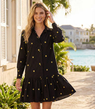 Yellow long sleeve embroidered ruffle hem dress with collar and button front