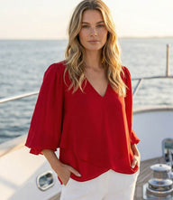 Silky crepe layered sleeve asymmetric top with V-neck and gathered shoulders in petite size