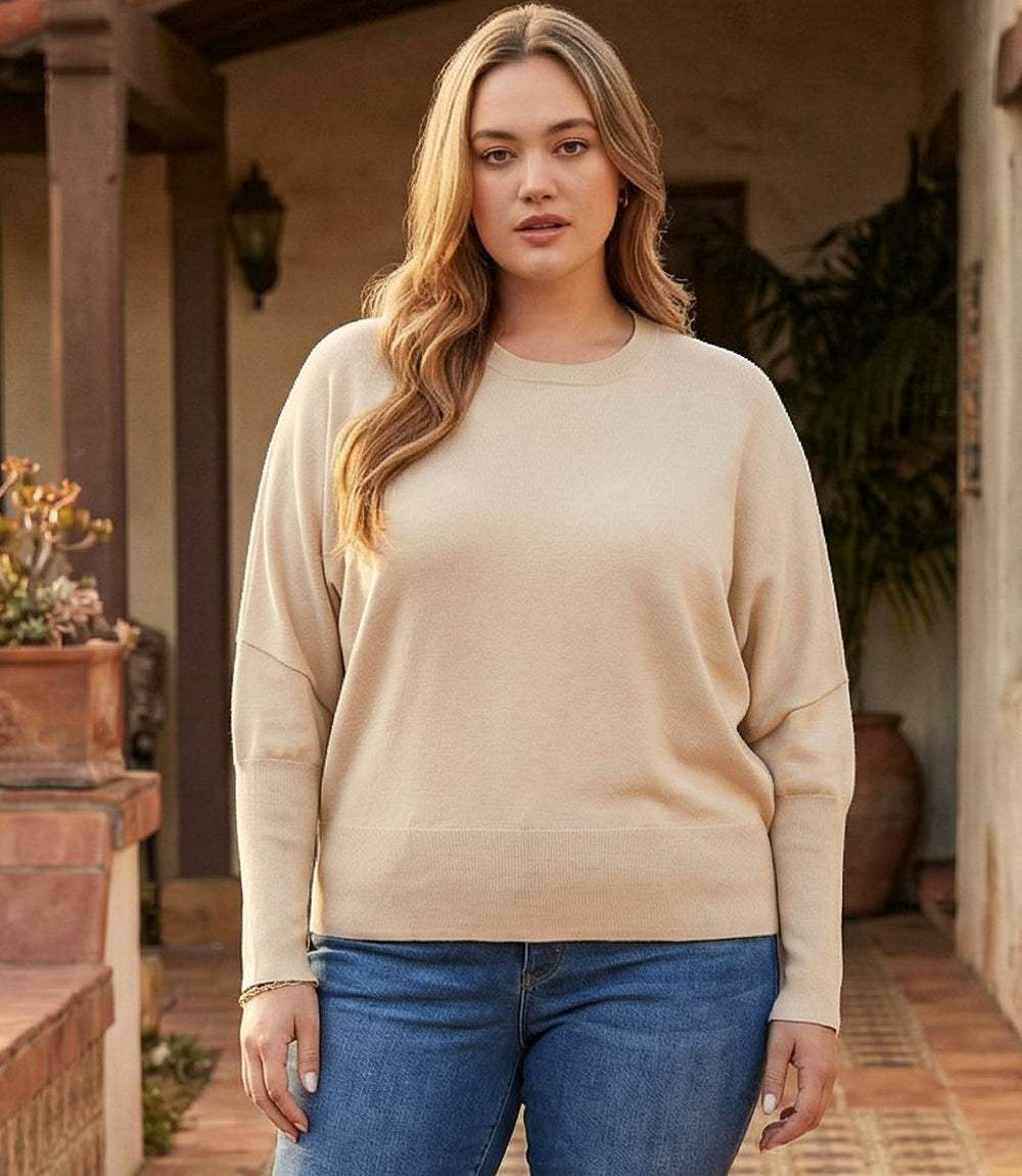 Plus size dolman sleeve sweater with crew neck and ribbed cuffs in relaxed fit