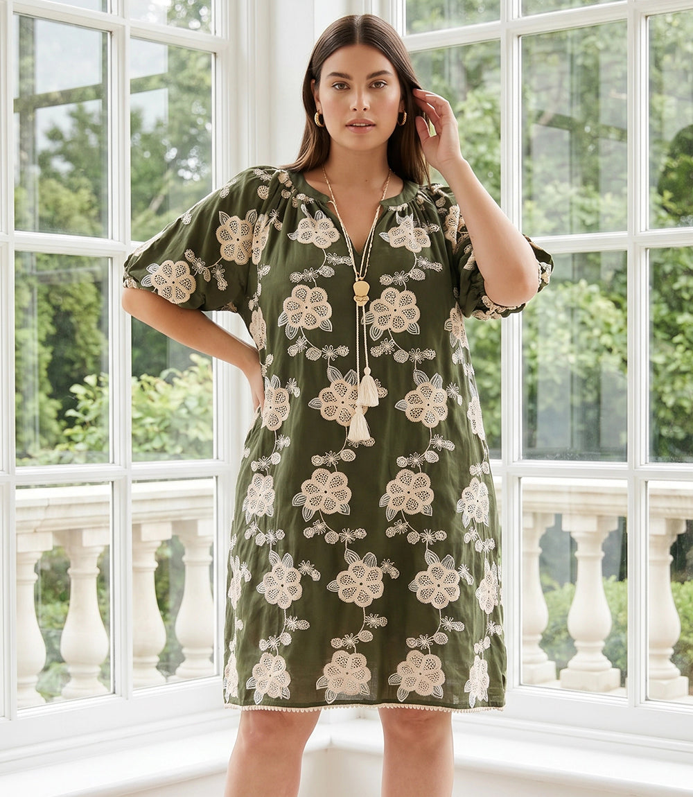 Plus size puff sleeve tassel dress in breathable cotton with relaxed fit and tasseled neckline