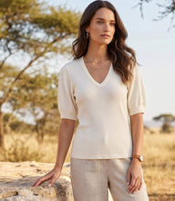 Ribbed short sleeve top with V-neck and puff sleeves in wide rib knit fabric