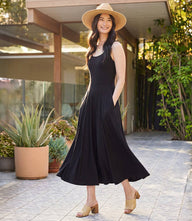 Sleeveless flare midi dress with scoop neck and side pockets in rayon spandex blend