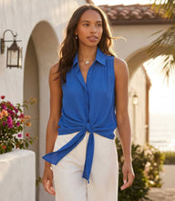 Sleeveless tie-front top in silky crepe with button-up front and classic collar