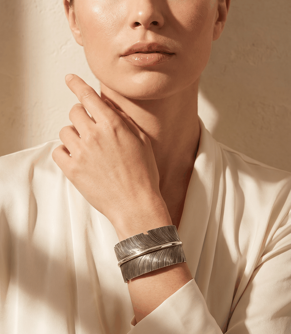 Sterling Silver Feather Bracelet open cuff with detailed feather engraving and layered Southwestern design by Lena Platero