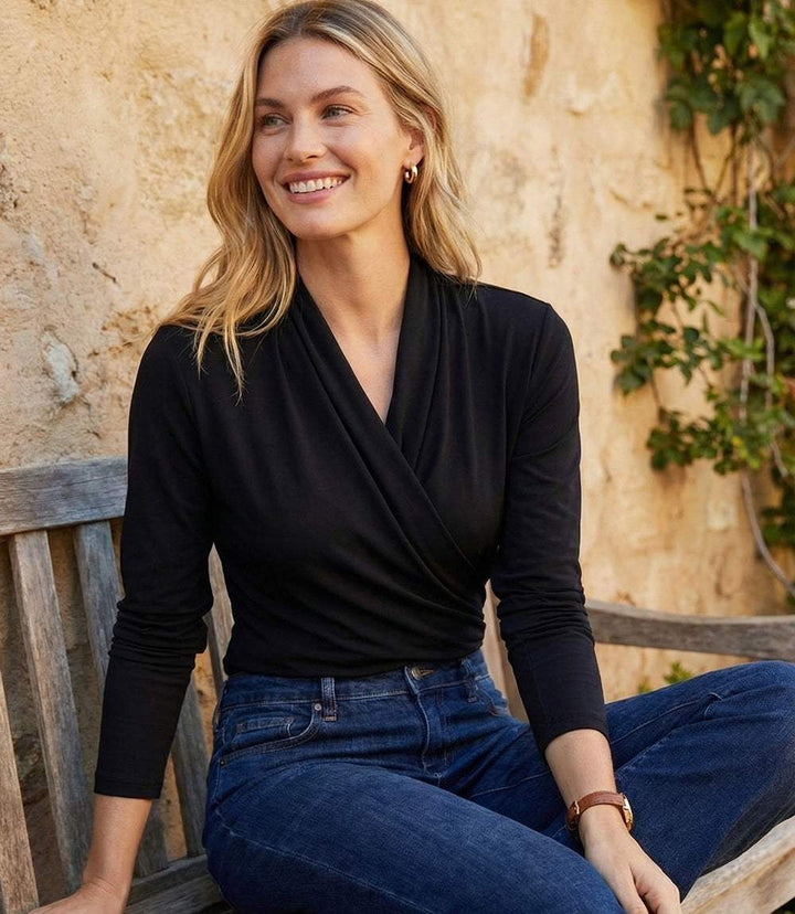 Travel jersey drape front crossover top with side pleats and drop shoulder sleeves