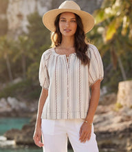 Women wearing a Stripe Puff Sleeve Embroidered Peasant Top with button-front and embroidered details
