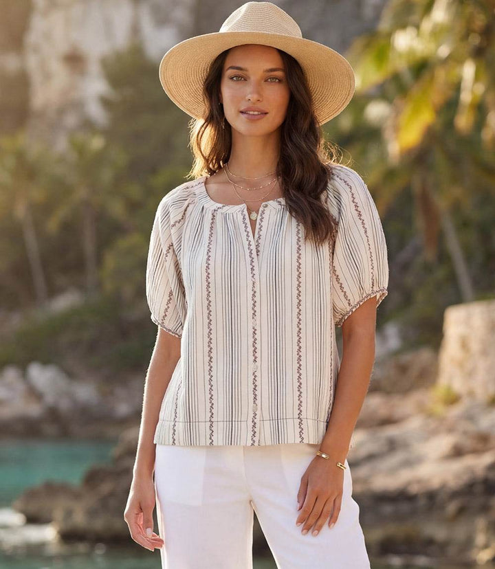 Women wearing a Stripe Puff Sleeve Embroidered Peasant Top with button-front and embroidered details
