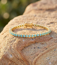 Gold vermeil turquoise tennis bracelet with cubic zirconia and double safety latch clasp