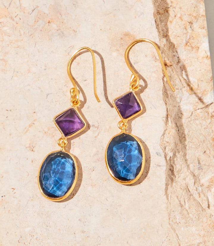 Mixed gemstone drop earrings with blue iolite and purple amethyst set in 18k gold plated silver.