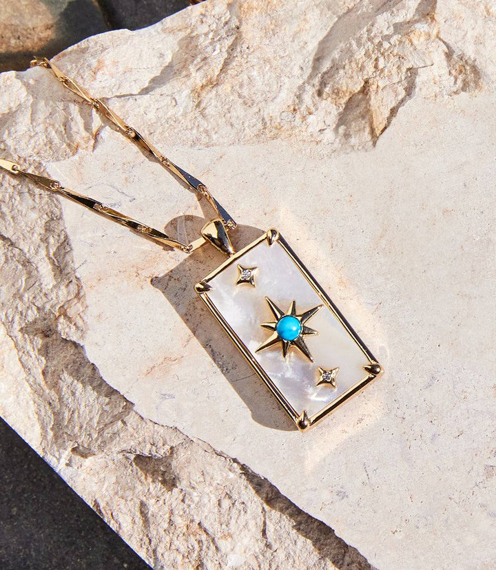 Star pendant necklace with turquoise and mother of pearl on gold plated chain