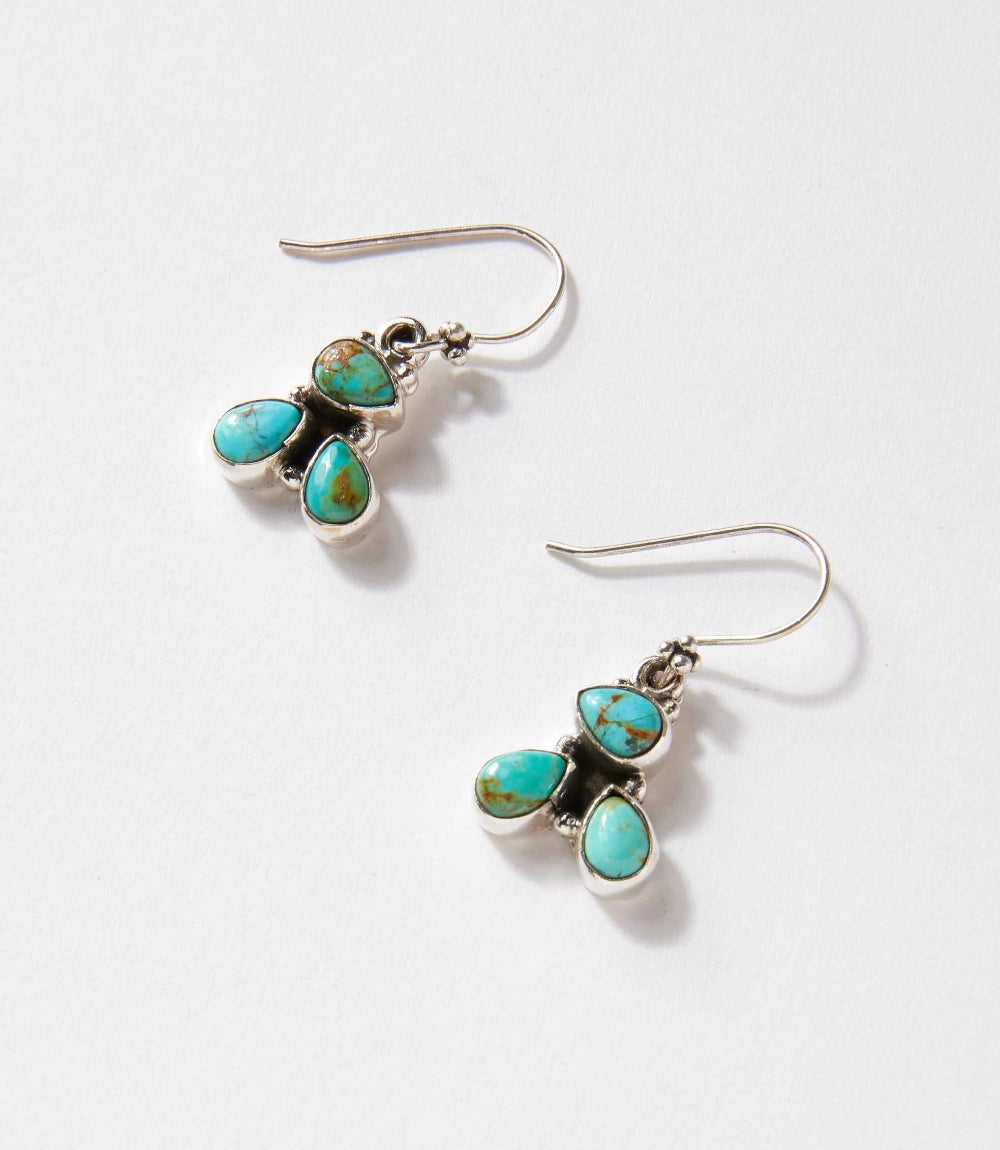 Turquoise dangle earrings with sterling silver and natural stone details