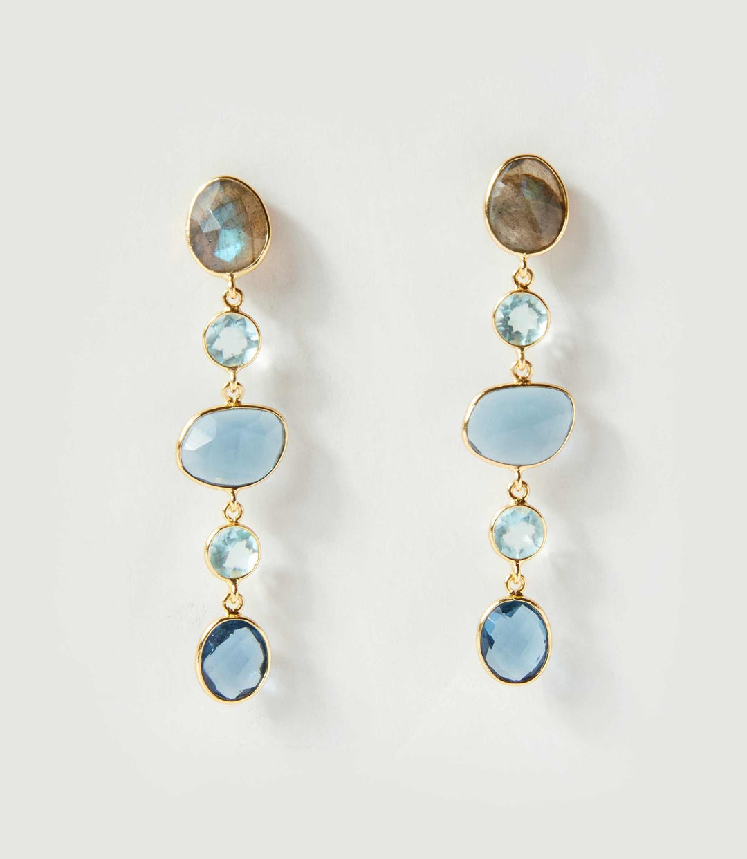 Mixed gemstone strand earrings with blue iolite, blue topaz, labradorite, and 18K gold plating