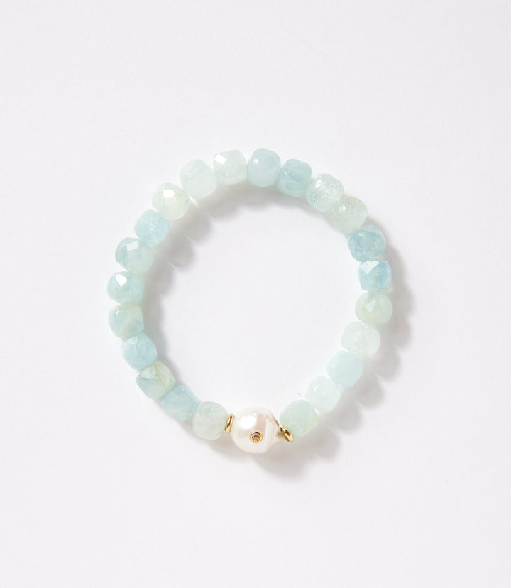 Aquamarine beaded stretch bracelet with pearl and gold-filled accents in soft blue tones