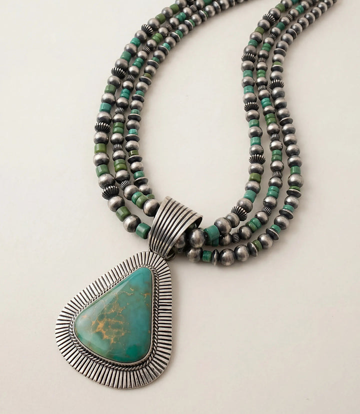 Royston Turquoise Multi Strand Pendant Necklace And Earring Set