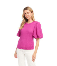 Petite size puff sleeve textured knit top in vibrant pink with crew neck and fitted silhouette