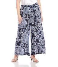 Plus size wide-leg pants with light blue and white paisley vine print on navy fabric, elastic waistband and side pockets
