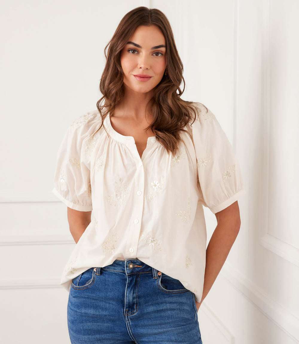 Short sleeve embroidered peasant top in breathable cotton with front buttons and relaxed fit