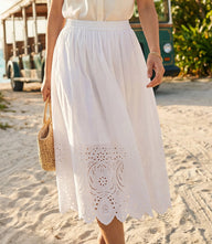Lightweight cut-out embroidery midi skirt with elastic waistband and flowy silhouette