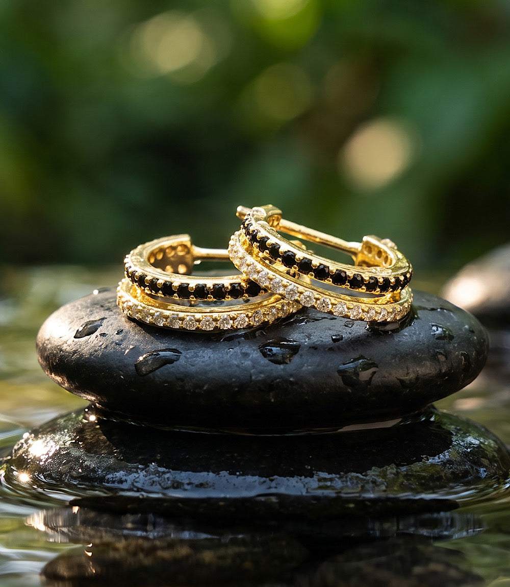 Twin Huggie Earrings in gold vermeil with black and clear cubic zirconia double hoops