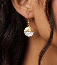 Pearl and hammered gold disc earrings with luminous pearl inlay and textured matte gold plated brass design