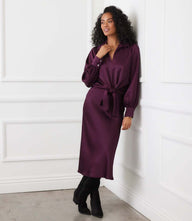 Long sleeve satin top with tie-front closure, gathered cuffs, and pointed collar in recycled satin fabric