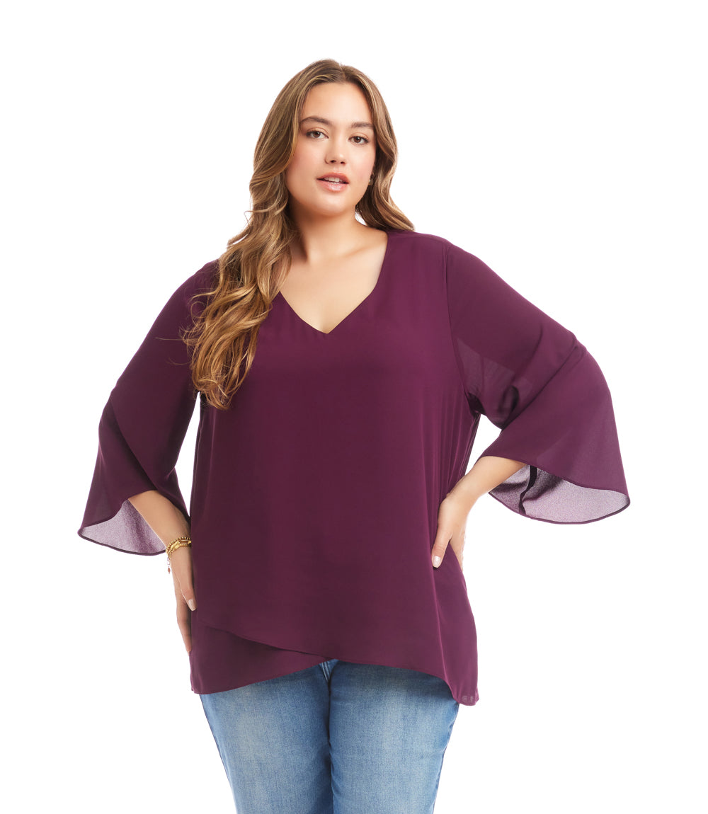 Plus size bracelet sleeve asymmetric top in purple silky crepe with V-neck and layered hem