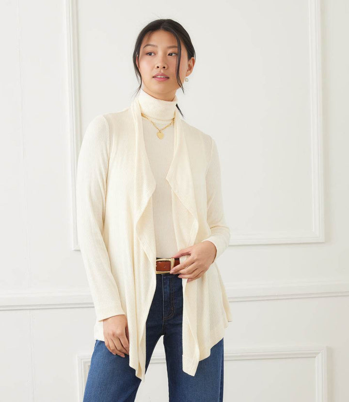 Petite size long sleeve ribbed cardigan with draped open front and high-low hem in cream color