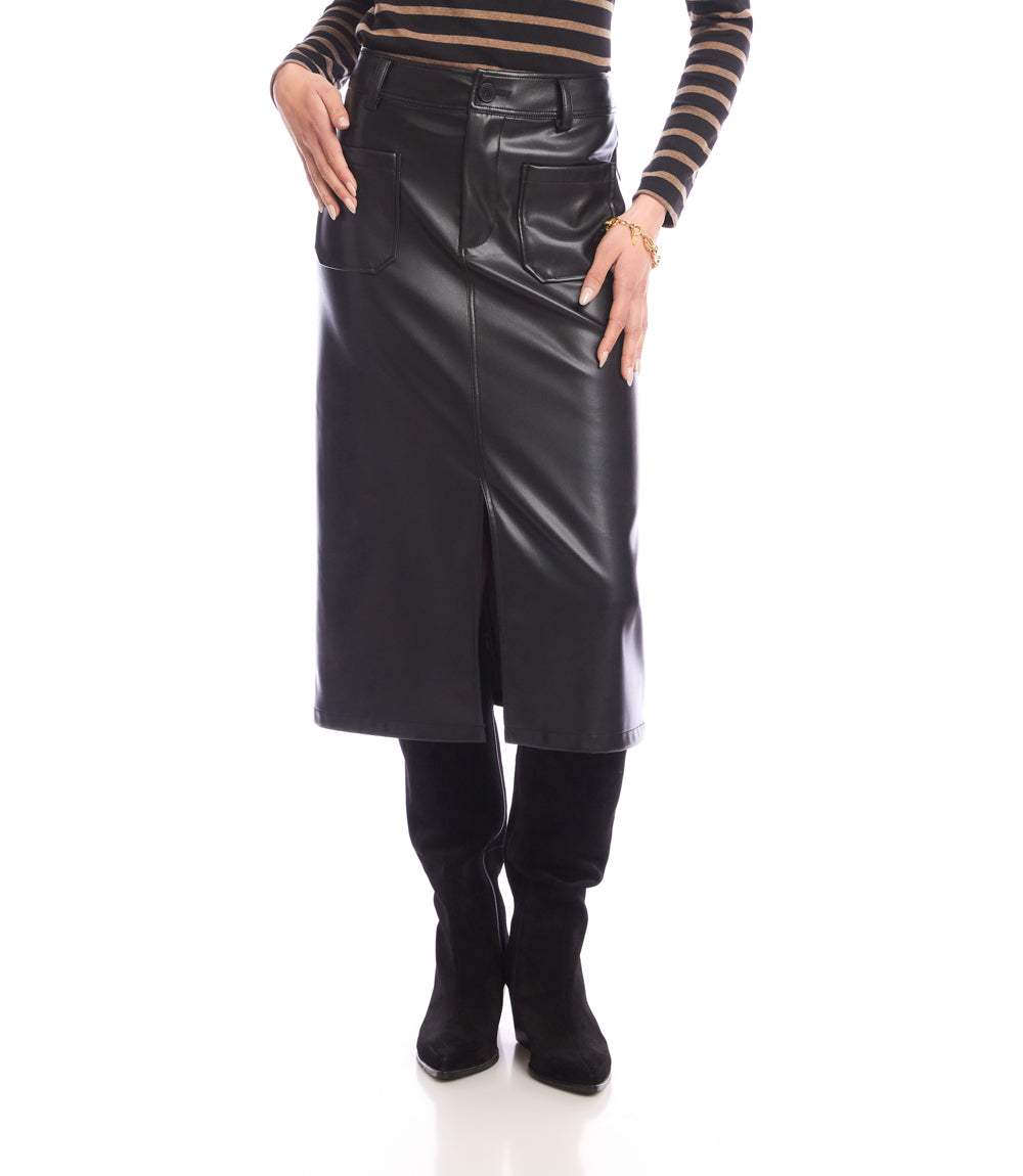 Black faux leather midi skirt with front slit, button and zipper closure, belt loops, and four patch pockets worn with striped top and black boots