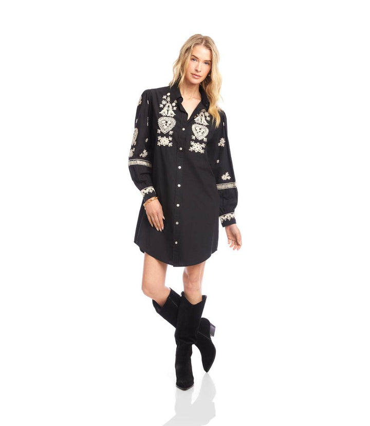 Black blouson sleeve shirtdress with cream rope-stitch embroidery, shell buttons, and shirttail hem