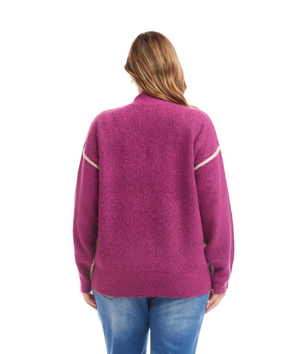 Plus size colorblock mock neck sweater with drop shoulder sleeves and bold paneling, shown from back