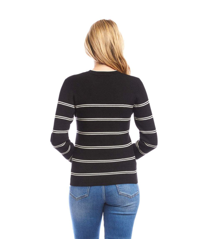 Woman wearing a slim-fit black double stripe ribbed sweater with cream horizontal stripes, paired with blue jeans, viewed from the back.