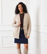Classic cardigan sweater with button-front, V-neckline, raglan sleeves, and front pockets