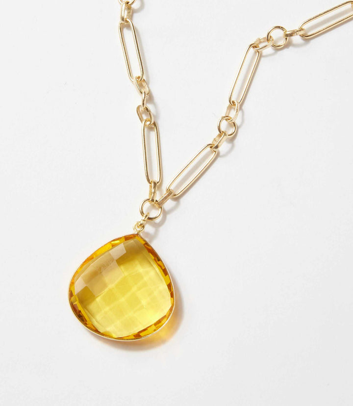 Gold chain necklace with faceted citrine quartz pendant in warm golden hue