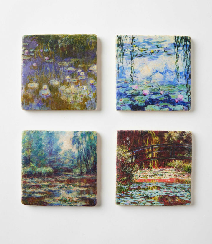 Set of 4 Monet Tile Marble Coasters with Impressionist water lily artwork on tumbled marble squares.