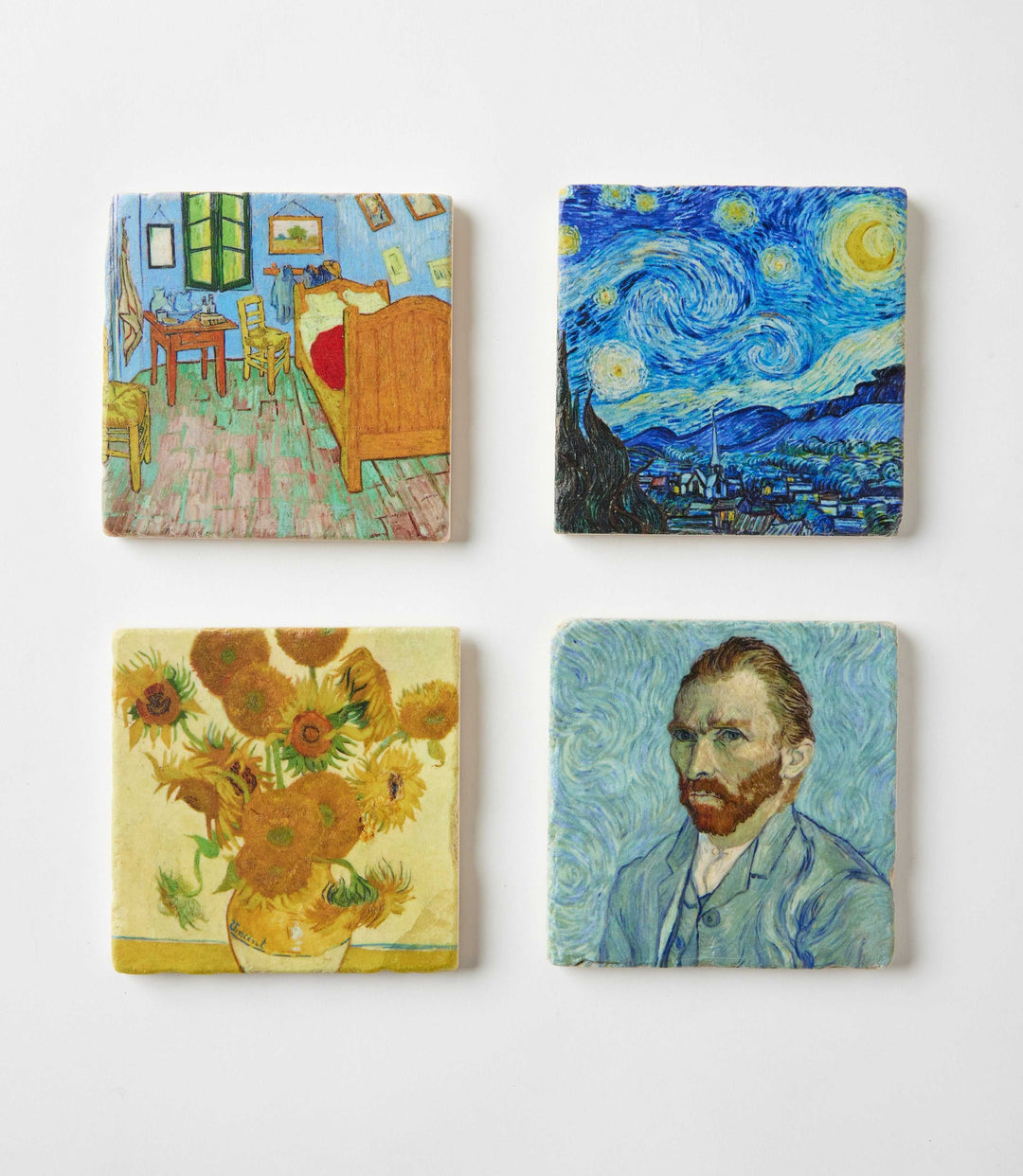 Set of four Van Gogh marble coasters featuring Starry Night, Sunflowers, Bedroom in Arles, and self-portrait artwork on tumbled stone