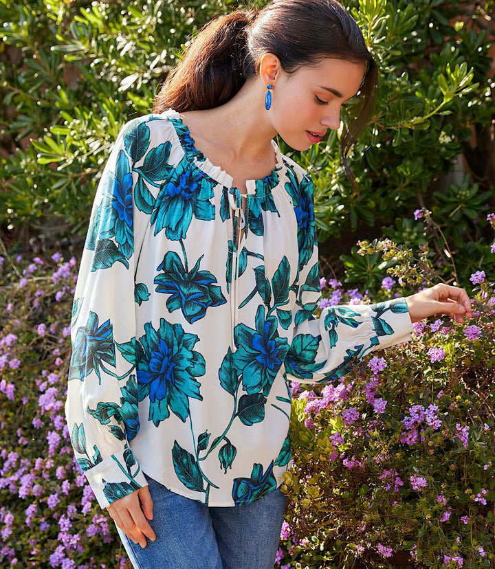 Blue wild rose blouson sleeve ruffle tie-neck peasant top with raglan sleeves and button cuffs