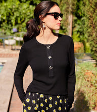 Long sleeve ribbed top with hand-painted flower buttons and crew neckline