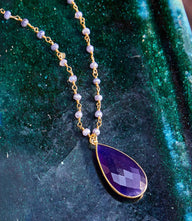 Beaded teardrop pendant necklace with faceted amethyst and gold-plated brass on delicate matching beads
