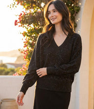 Sequin V-Neck Sweater with subtle allover sequins and ribbed edges in a relaxed fit