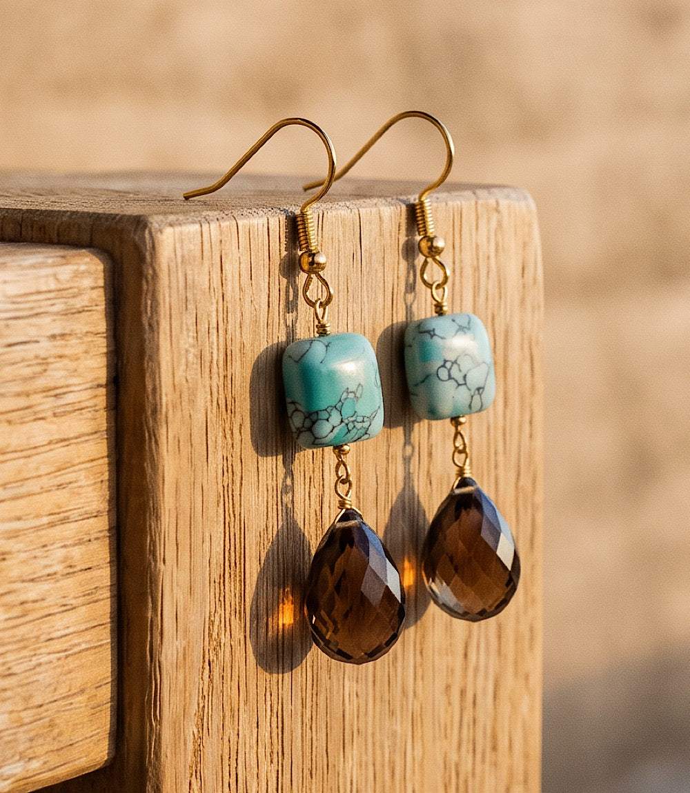 Mixed turquoise gemstone drop earrings with marbled turquoise and faceted brown teardrop gems in gold-tone setting