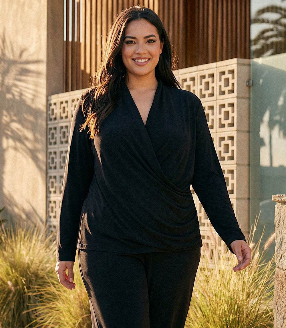 Plus size travel jersey drape front crossover top with long sleeves and side pleats