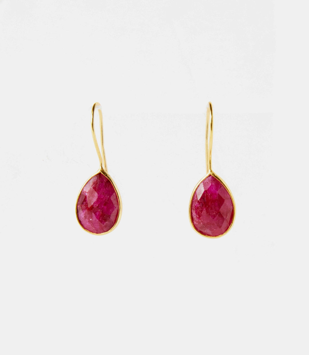 Pair of ruby gemstone teardrop earrings with 18 ct. gold plated silver hooks, faceted red sillimanite stones.